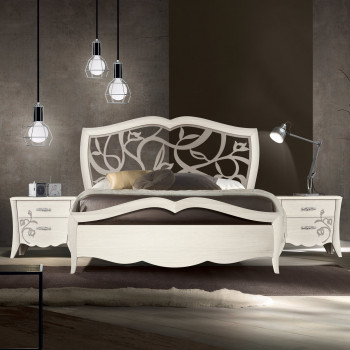 Letto matrimoniale in frassino con testata traforata in ambiente moderno