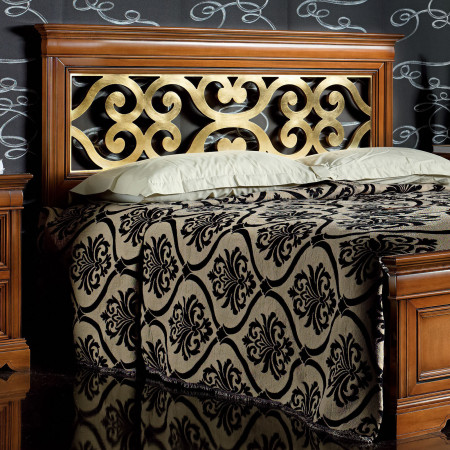 Letto matrimoniale con testata traforata decorativa