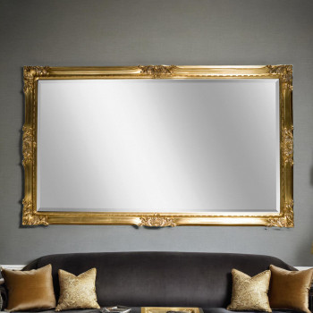 Specchiera classica con cornice dorata intagliata