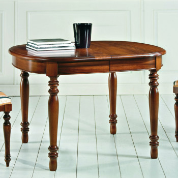 Tavolo ovale noce massello allungabile con dettagli gambe