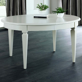 Tavolo ovale allungabile, dettaglio del piano Tavolo ovale allungabile con piano impiallacciato