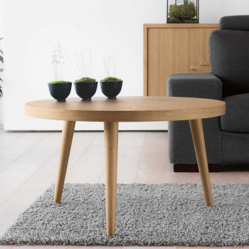 Tavolino rotondo in rovere gambe tornite a spillo su tappeto grigio