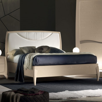 Letto matrimoniale con testata imbottita, dettaglio rete