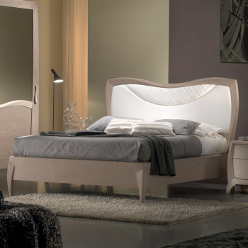 Letto matrimoniale sagomato con testata imbottita in legno di frassino