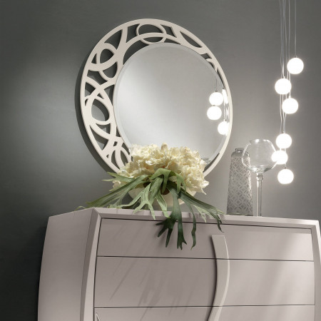 Specchiera rotonda traforata con cornice in legno