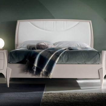 Letto matrimoniale curvo con testata imbottita e pannelli in legno