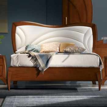 Letto matrimoniale sagomato, dettaglio testata imbottita