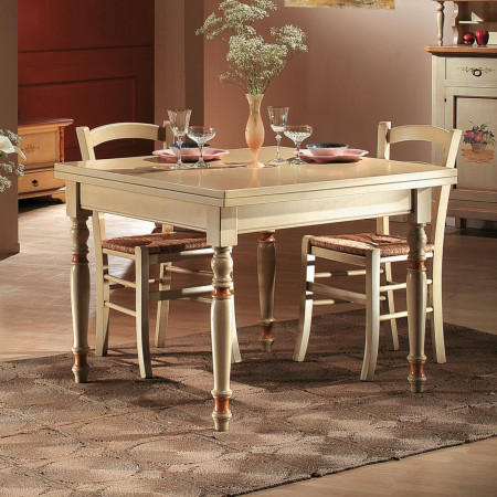 Tavolo a libro 100x100 con gambe tornite e sedie