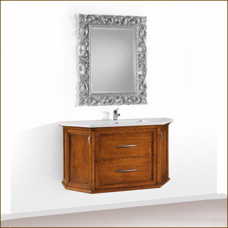 Specchiera con foglia argento sopra mobile in legno
