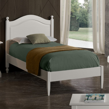 Letto in legno a una piazza con giroletto