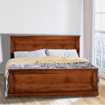 Letto matrimoniale in massello con testata decorativa