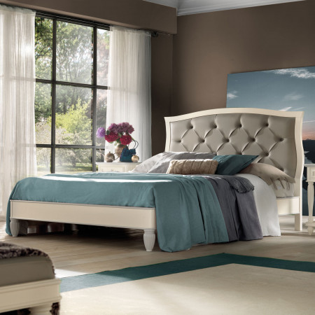 Letto king size con testata capitonnè in legno di noce