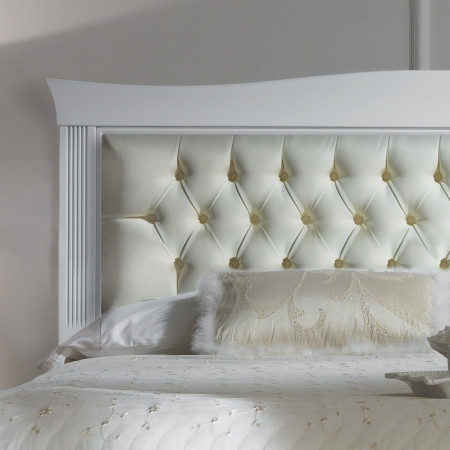 Dettaglio testata letto ecopelle capitonne