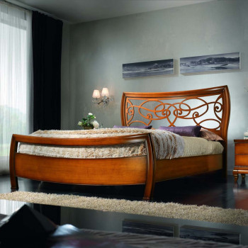 Letto king size in legno con testata traforata dettaglio