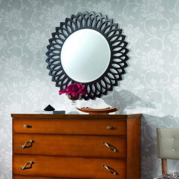 Specchiera rotonda traforata, dettaglio del motivo geometrico