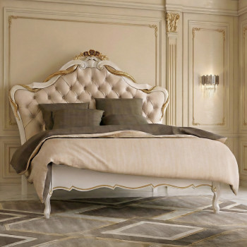 Letto Vienna in legno intagliato con testiera capitonnè