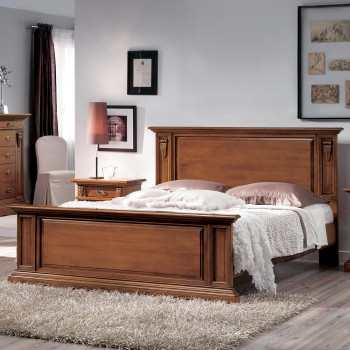 Letto due piazze con capitelli in legno massello