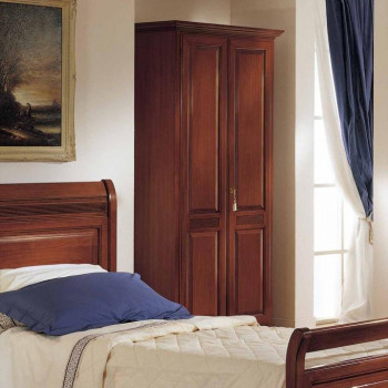 Armadio in legno 2 ante con bugne intagliate