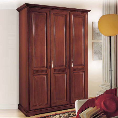 Armadio 3 ante in legno con bugne e inserti intagliati