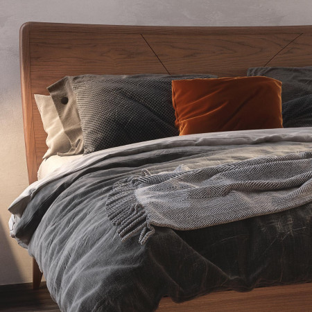 Letto moderno in legno con contenitore e testata incisa