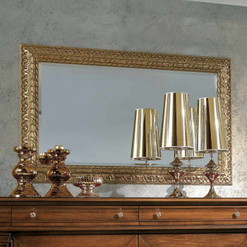 Specchiera foglia oro con dettagli floreali e spirale