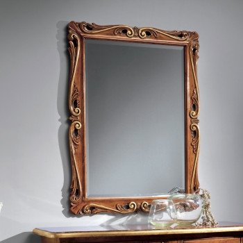 Specchiera intagliata a bassorilievo dettagli foglie