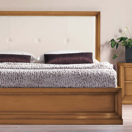 Letto con testata in ecopelle bianca, struttura in noce
