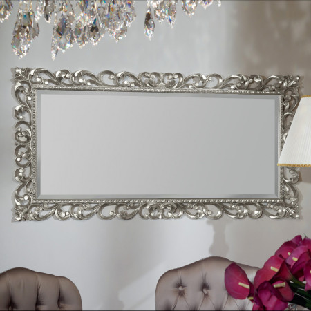 Specchiera intagliata in foglia argento con cornice decorata