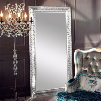 Specchiera contemporanea rivestita in foglia argento con cornice decorata