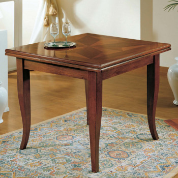 Tavolo libro intarsiato con stella, gamba sagomata