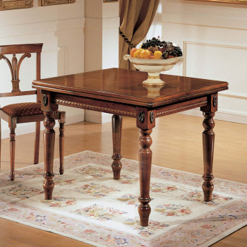 Tavolo classico gambe tornite allungabile a libro con dettagli intagliati