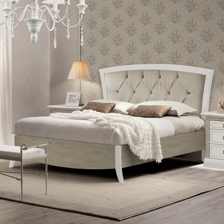 Letto matrimoniale con testata capitonné e contenitore