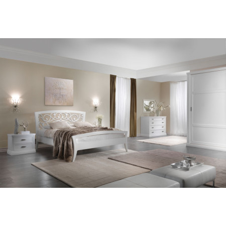 Letto con testata traforata Aurora in ambiente moderno