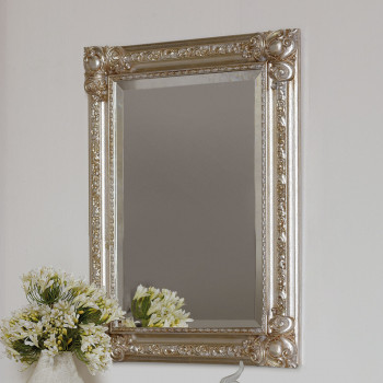 Specchiera classica con intagli e finitura argento