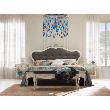 Letto a due piazze classico king size con testata imbottita