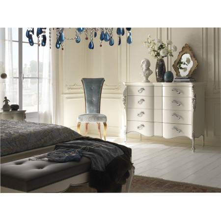 Camera da letto classica contemporanea con testiera capitonné