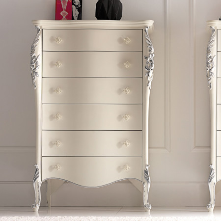 Cassettiera classica con intagli decorativi sulle spalle