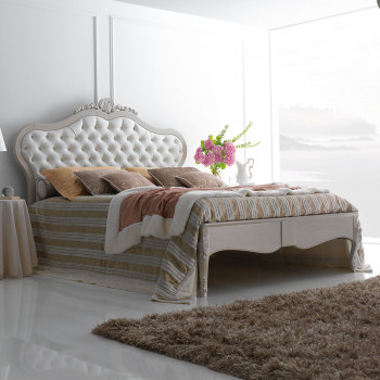Letto due piazze imbottito classico con testata capitonnè