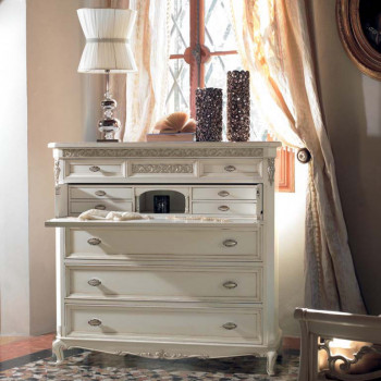 Comò piede 700 e spalla scantonata con cassetti intagliati